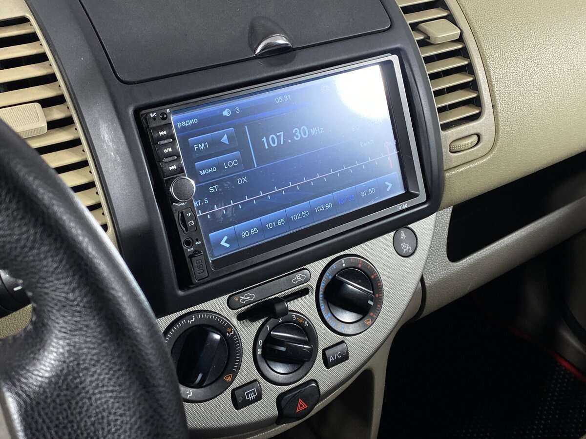 Nissan Note, 2006 Фото №13