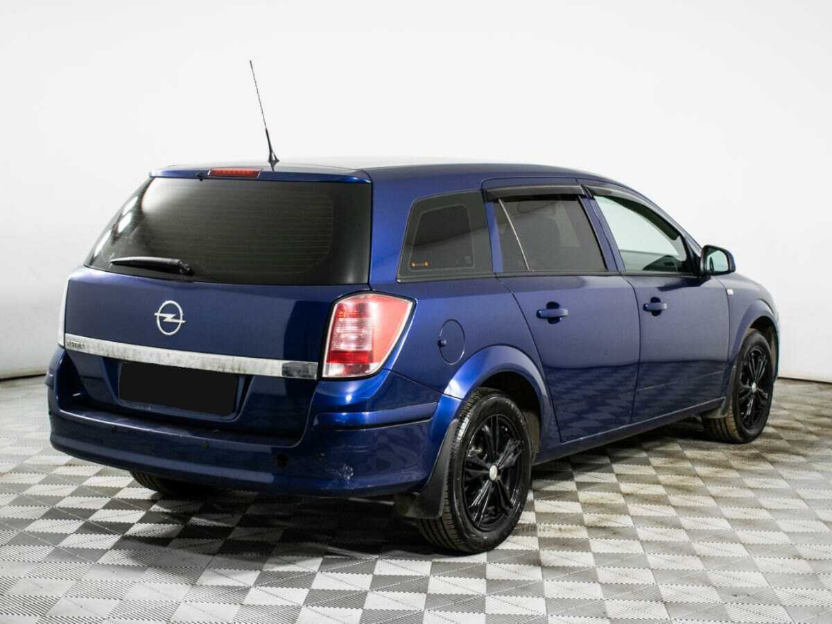 Opel Astra, 2010 - 173 790 км. | Фото №5