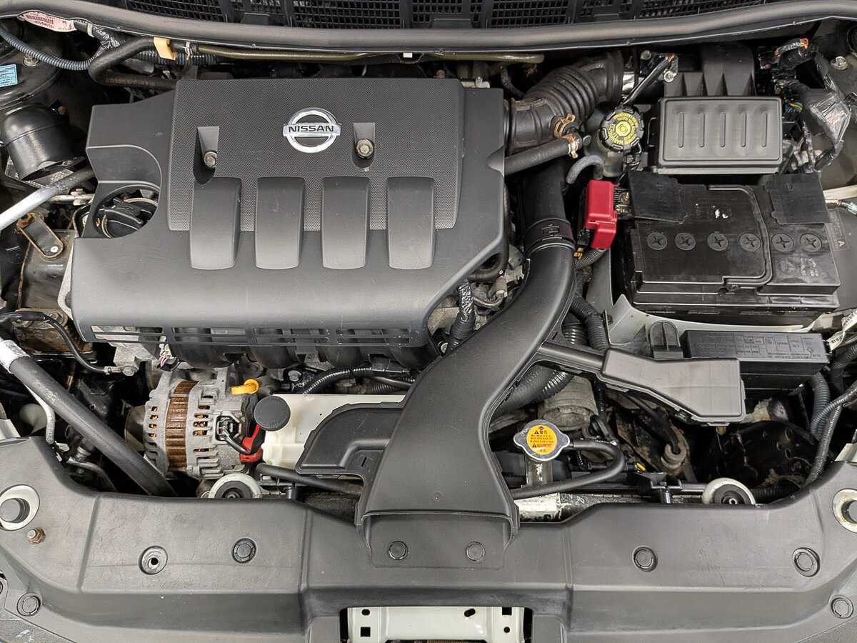 Nissan Tiida, 2010 Фото №9