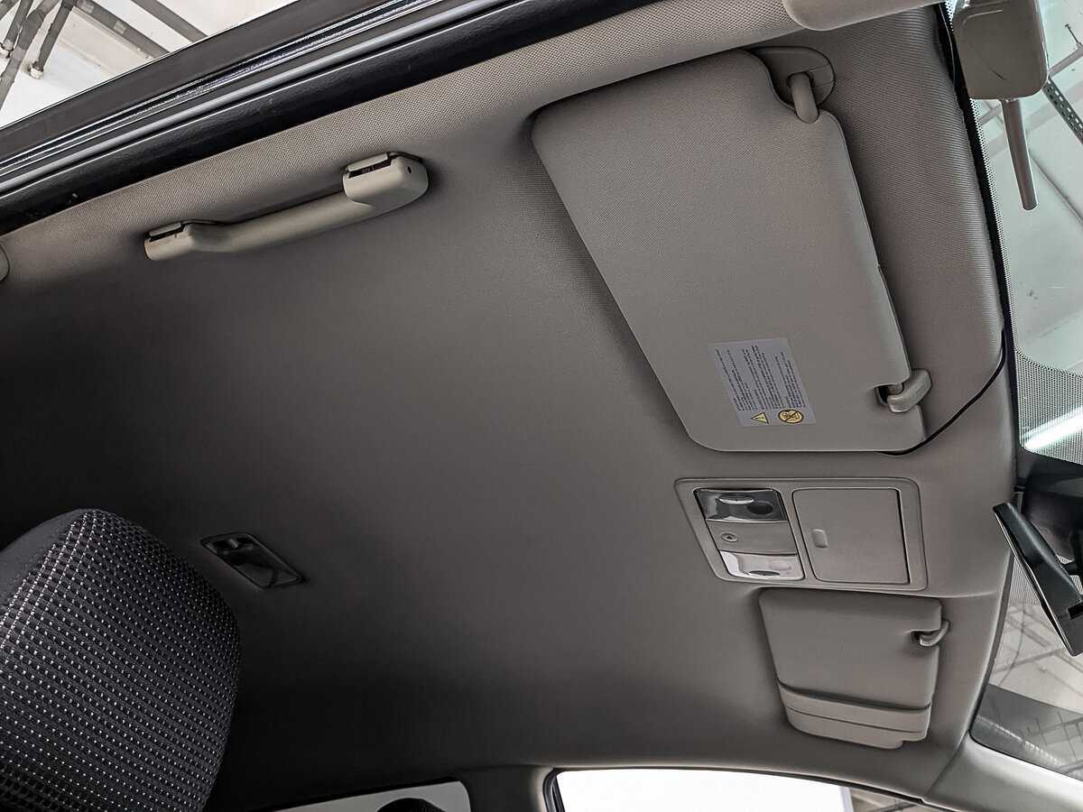 Nissan Tiida, 2010 Фото №22