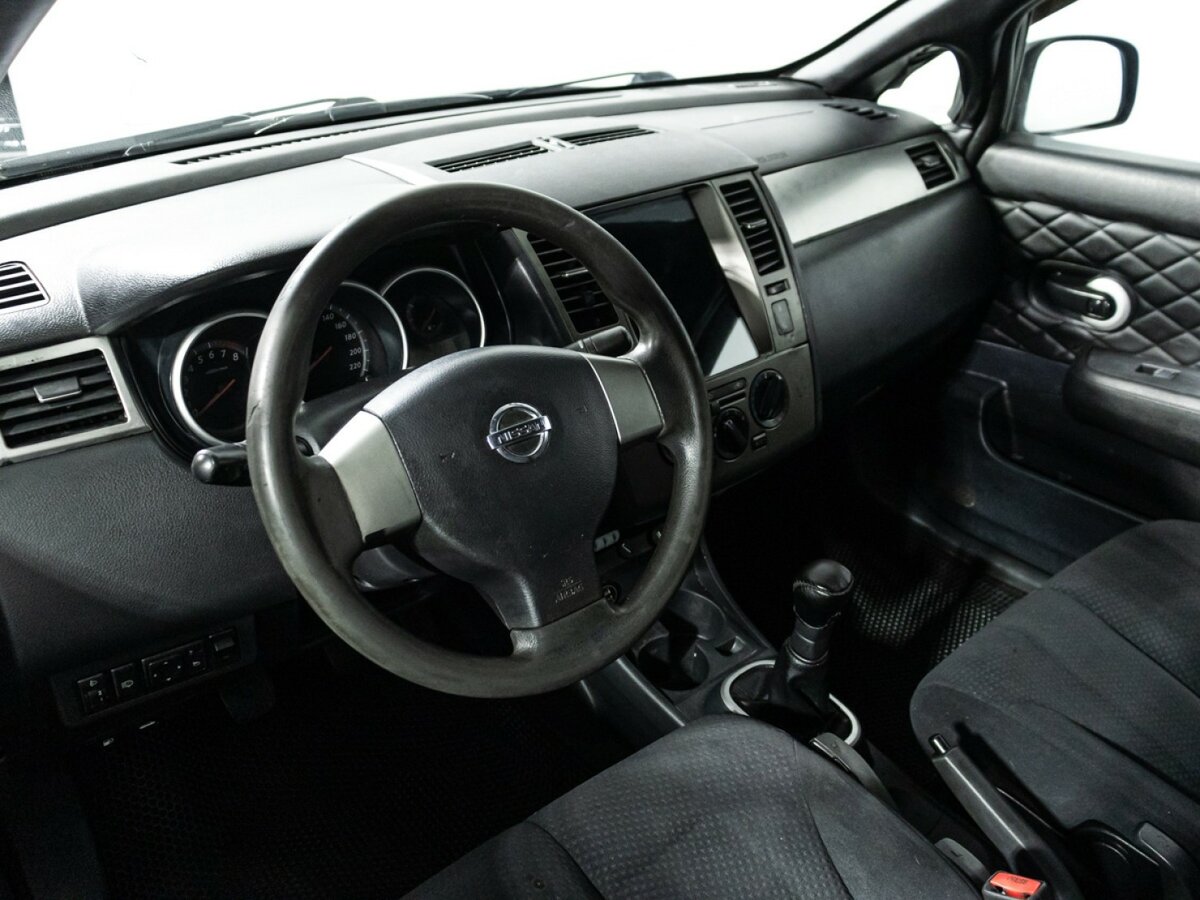 Nissan Tiida I Рестайлинг, 2010 Фото №11