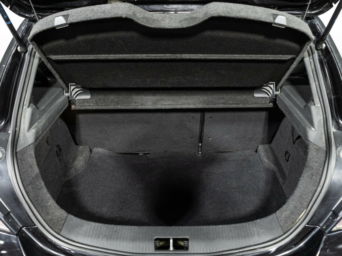 Opel Astra GTC H Рестайлинг, 2010 Фото №19